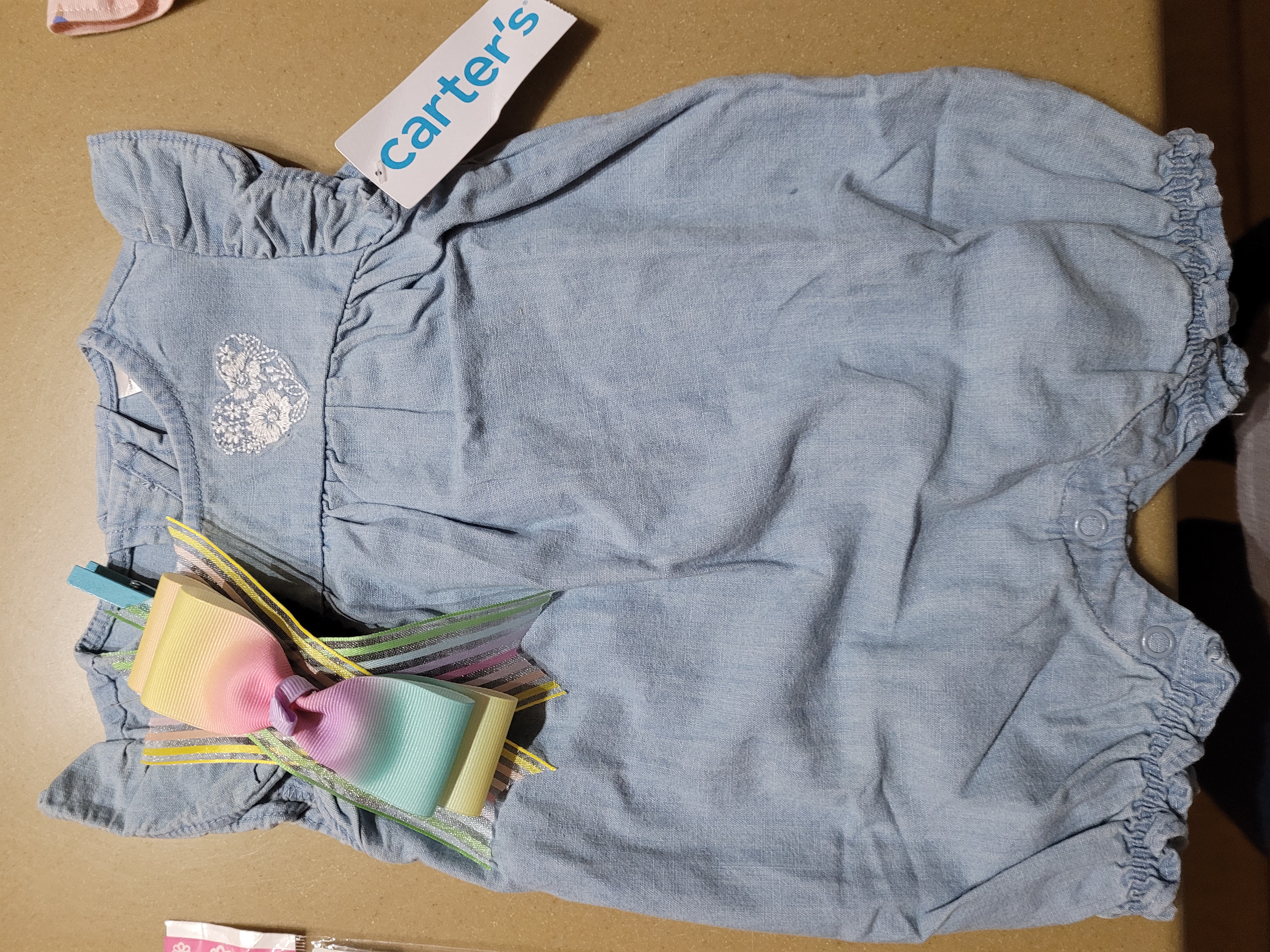 Blue baby outfit with a coordinating handmade bow