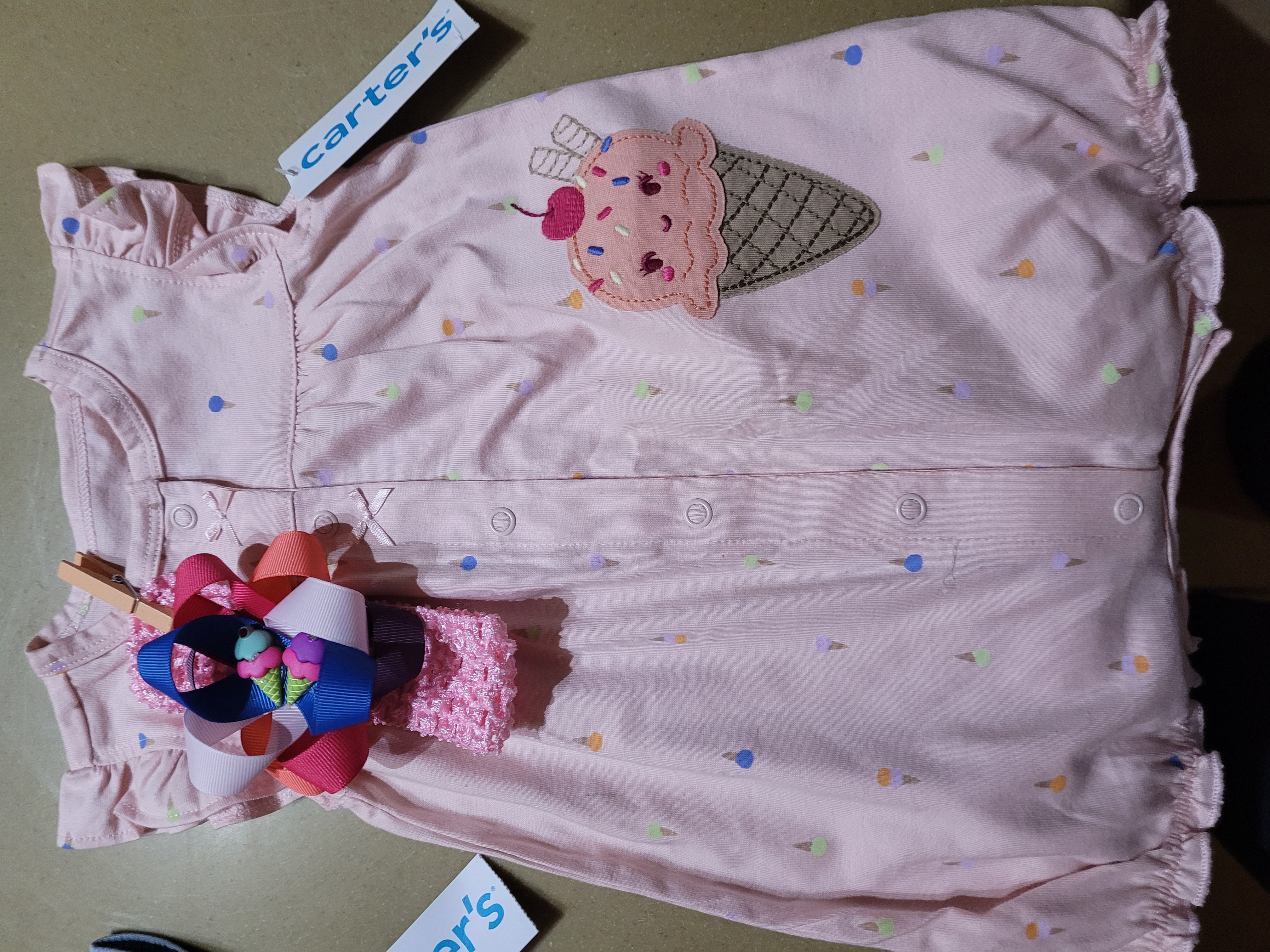 Pink baby outfit with a coordinating handmade hair bow