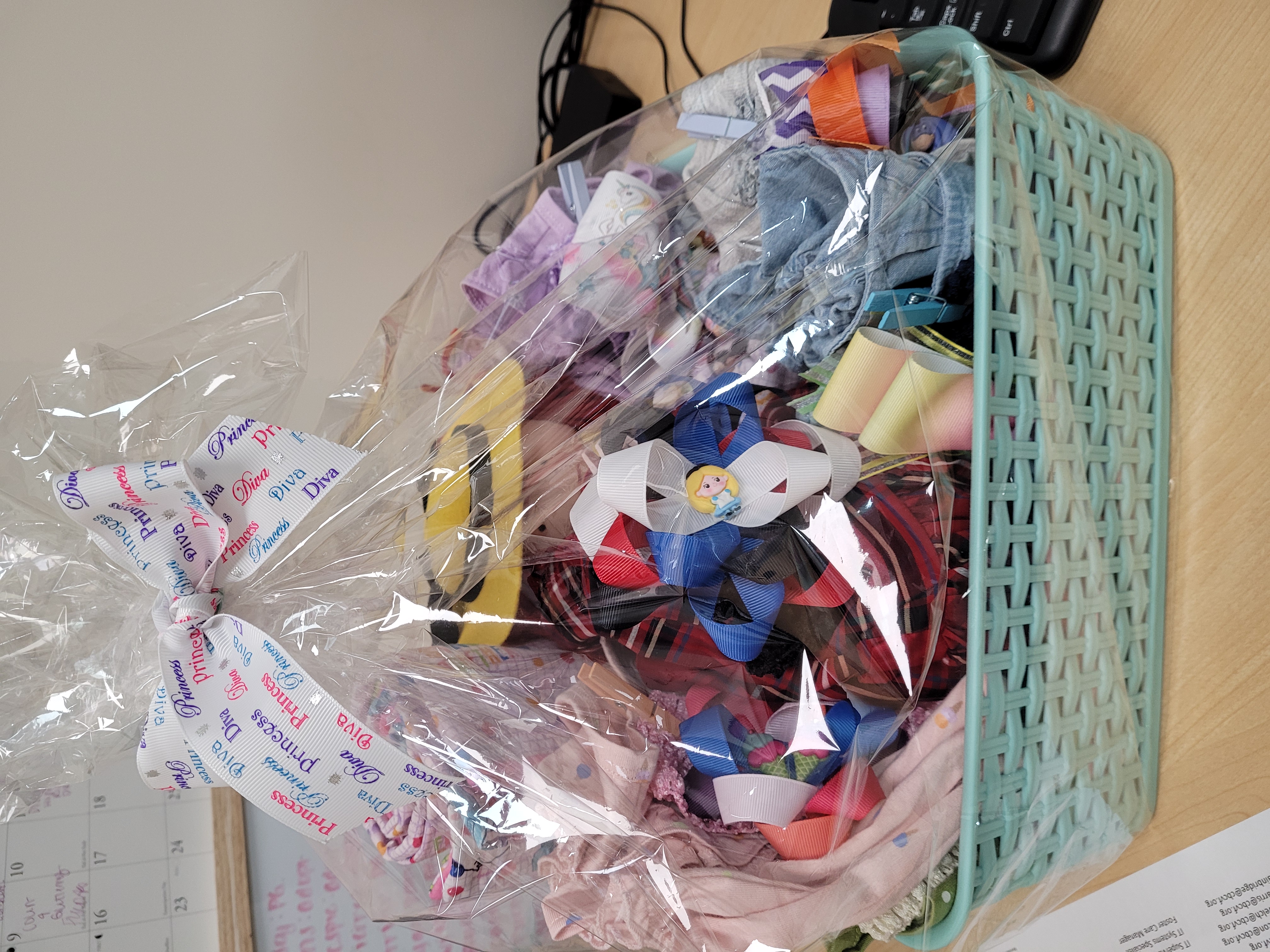 Large custom baby gift basket wrapped for giving